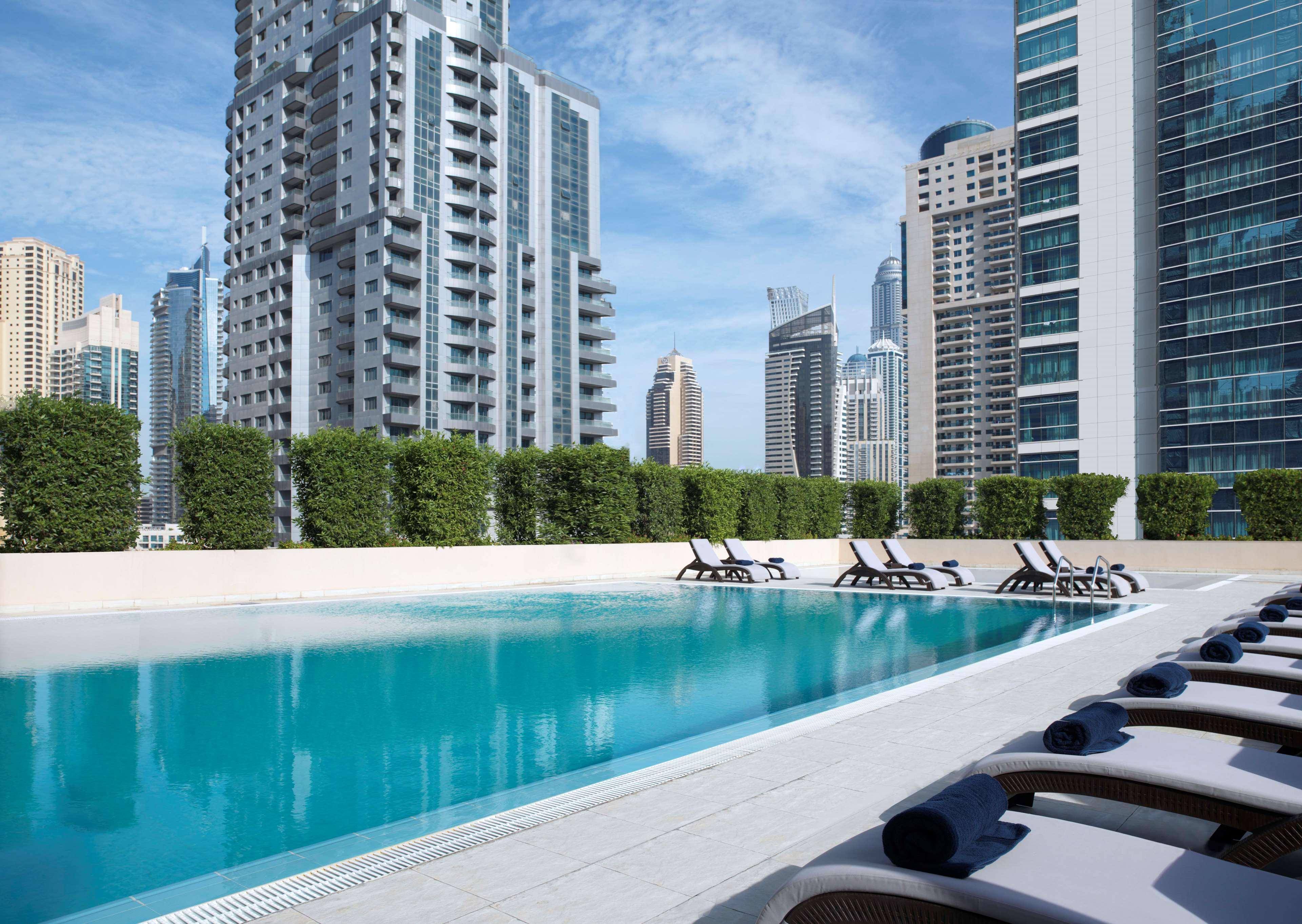 Radisson Blu Residence, Dubai Marina Esterno foto The swimming pool at the Address Downtown
